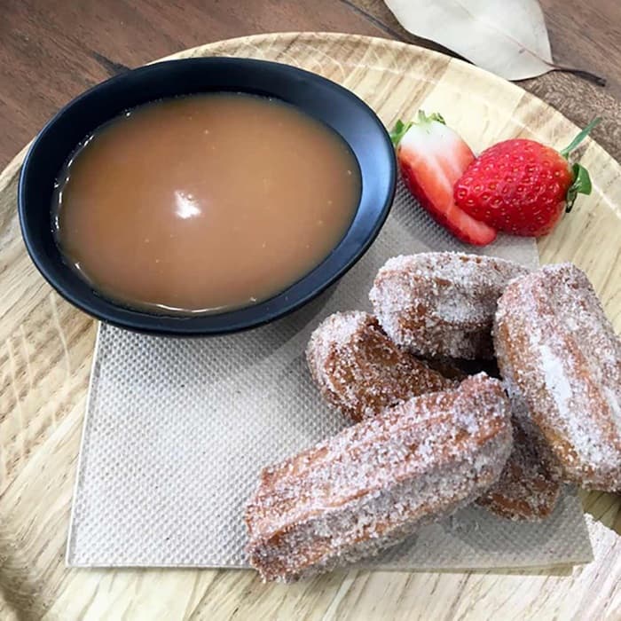 image of Chocolate churros with chocolate & salted caramel sauce