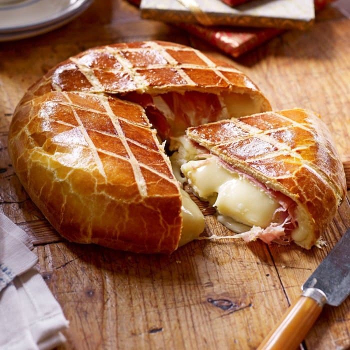 image of Brie wrapped in prosciutto & brioche